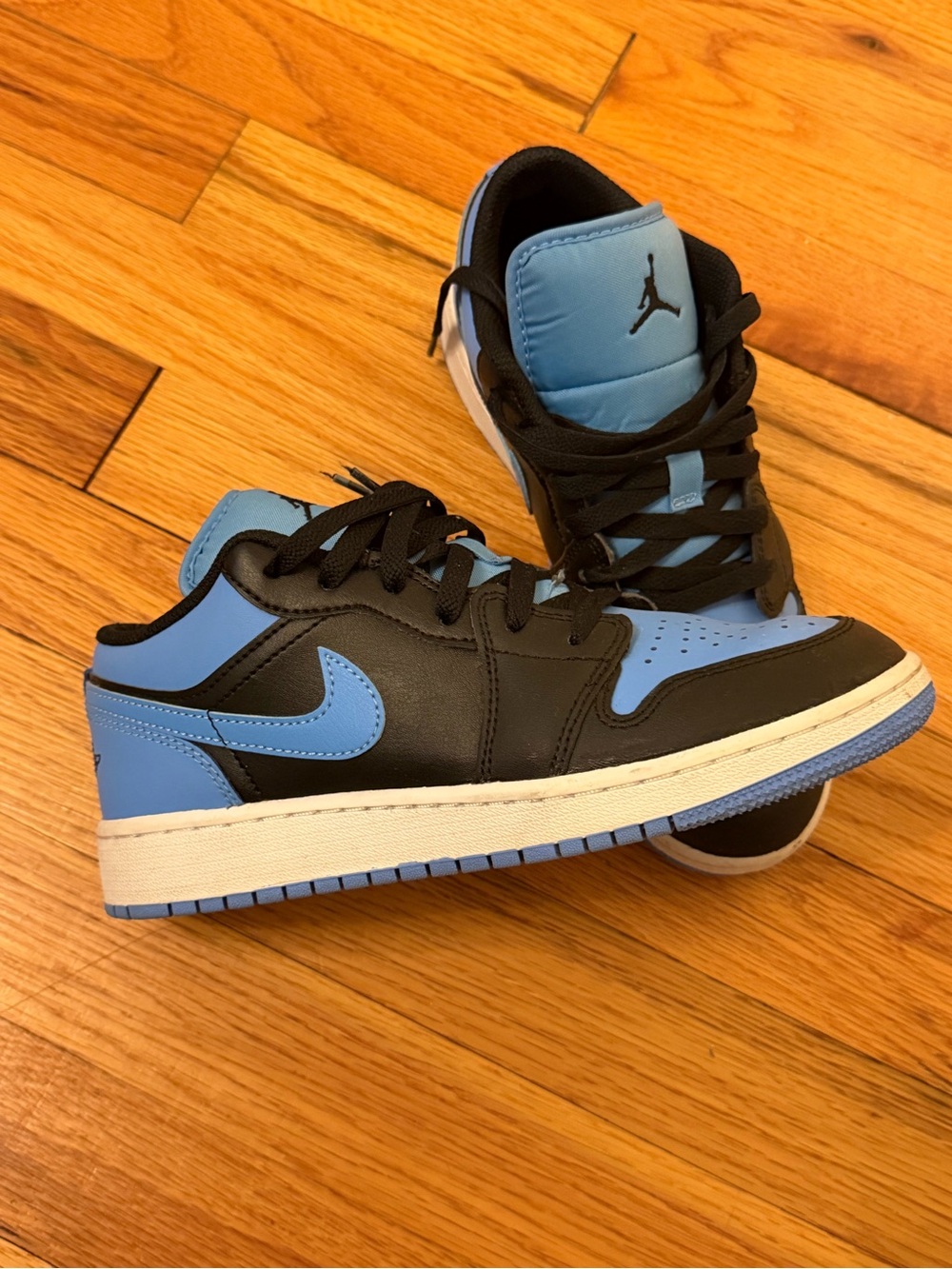 Jordan Women’s Low Top Sneakers in University Blue and Black